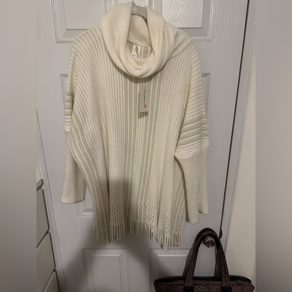 Women's light cream colored sweater